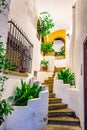 Stairs between white houses in old Spanish village Royalty Free Stock Photo